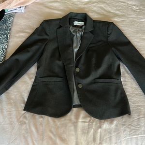 Calvin Klein modern fit suit jacket in charcoal grey. Size 6.